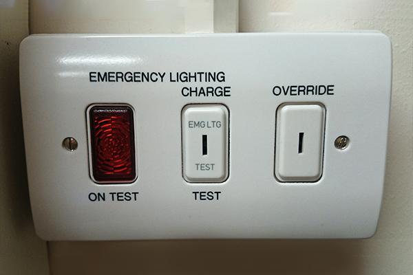 An image of a plug socket with emergency lighting controls.